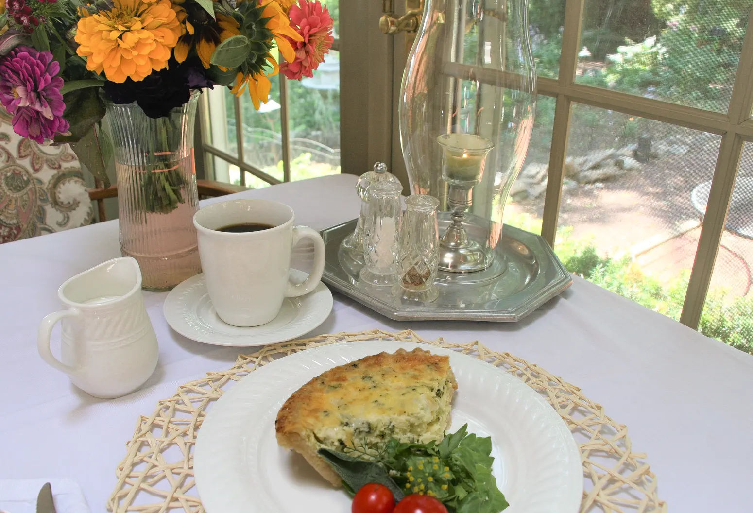 Breakfast table quiche and coffee